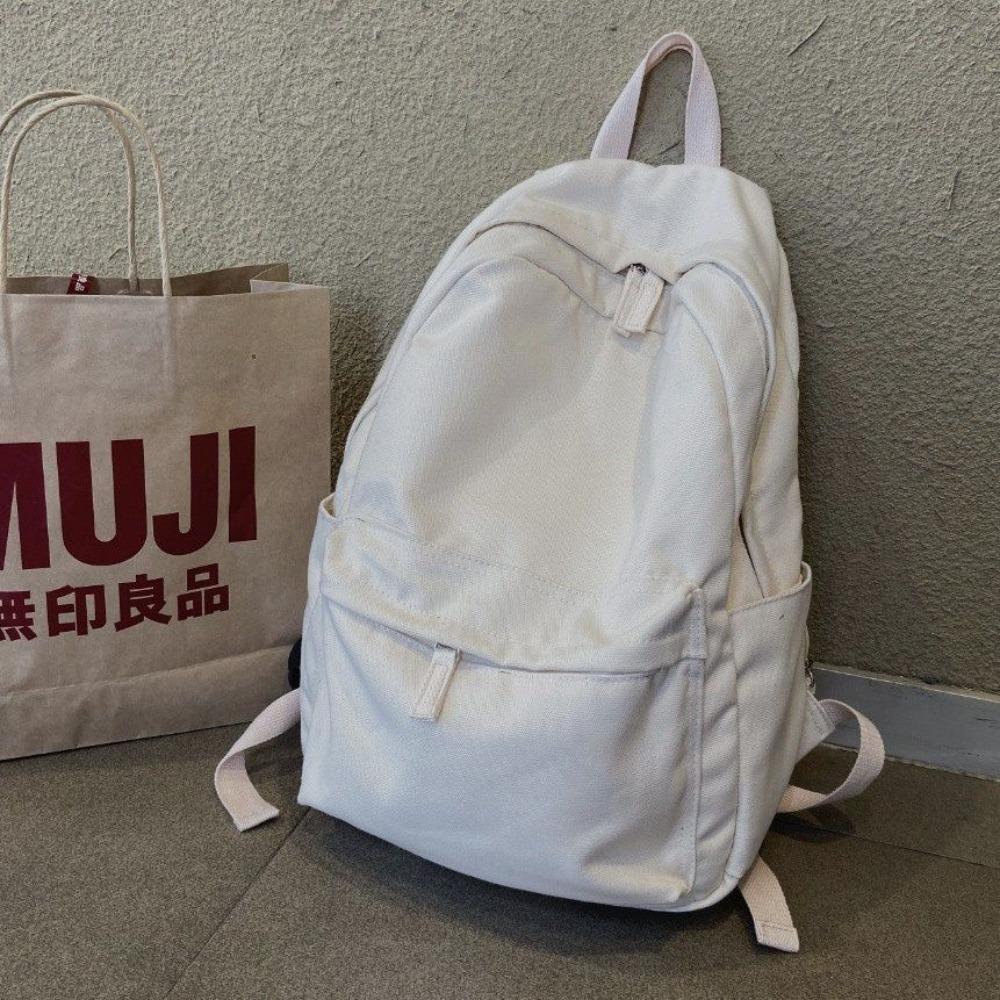 

Printless backpack casual simple waterproof computer bag new male and female middle school students schoolbag canvas backpack tide