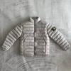Cuello alto bordado insignia de piedra brazalete ropa de algodón ropa de pan color sólido cálido ropa de algodón ligero para hombres y mujeres