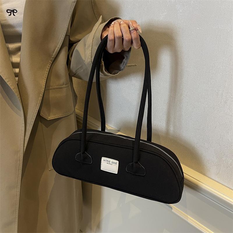 Niche retro matte underarm bag women's new bowling bag simple large-capacity portable commuter women's bag
