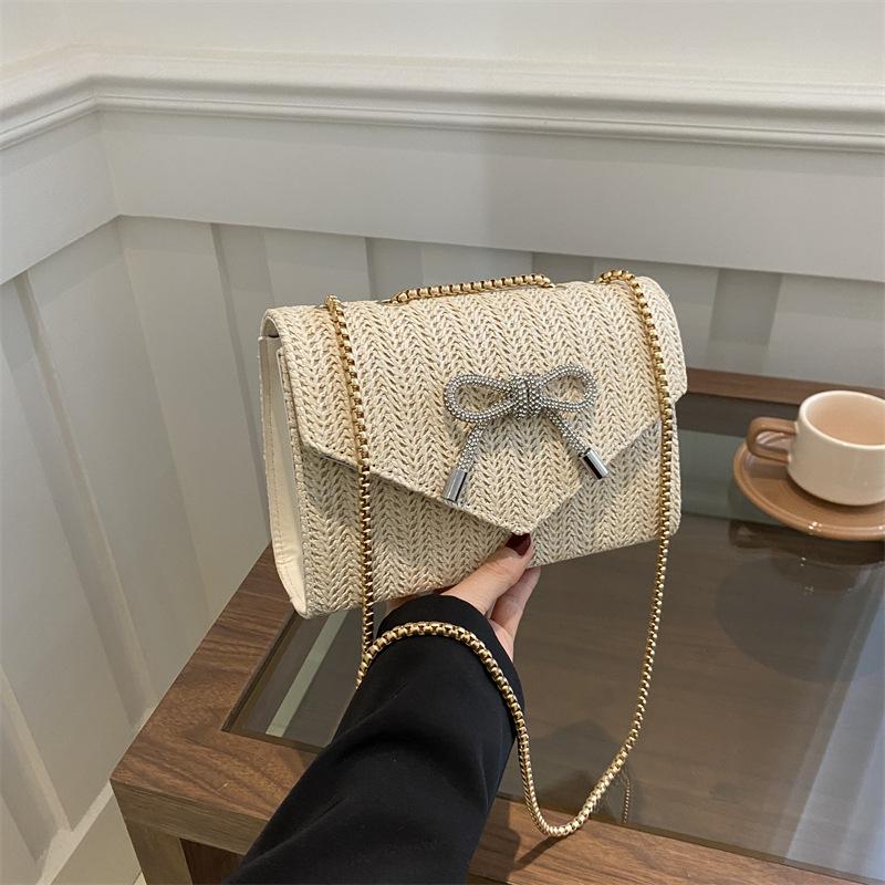 Trendy casual chain messenger bag beautiful bag 2025 summer new women's armpit bag straw woven personalized small square bag