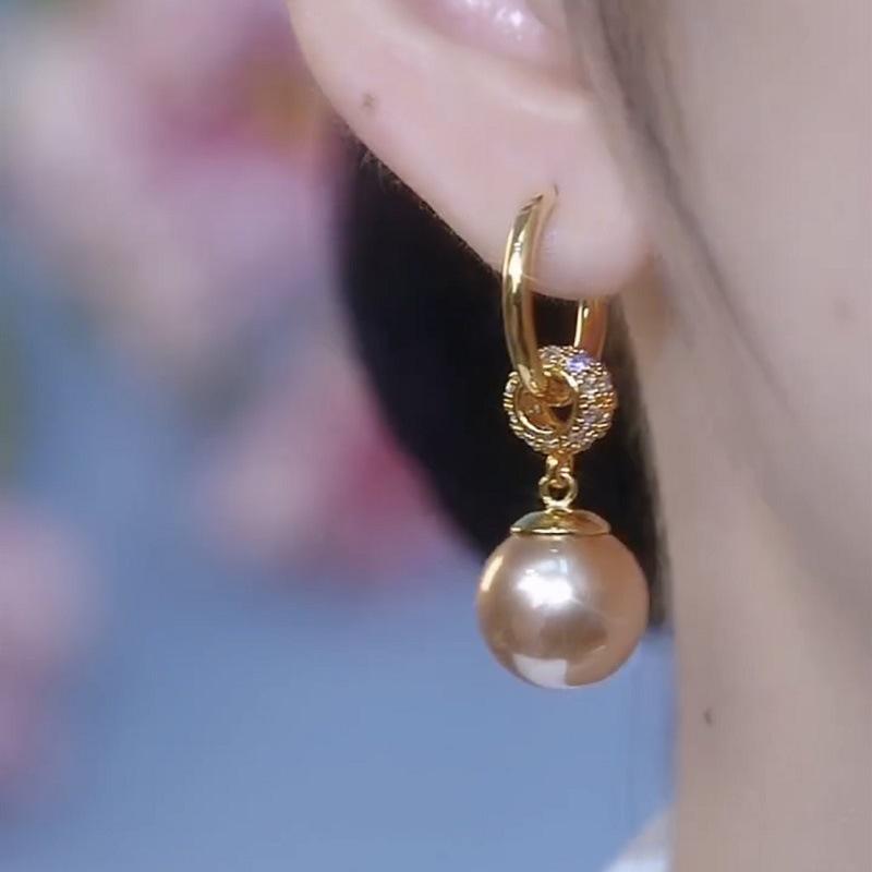 Champagne pearl fringed ear buckle, light luxury temperament, high sense of face, thin earrings, versatile Internet celebrity earrings