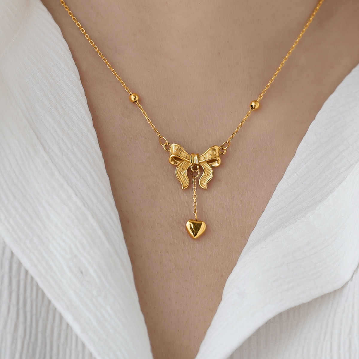 Gold Plated Stainless Steel Bow and Heart Drop Necklace