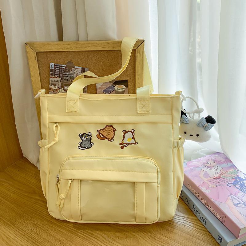 Cute messenger bag women's 2025 new Japanese pain bag large-capacity shoulder bag girl junior high school student portable tote bag
