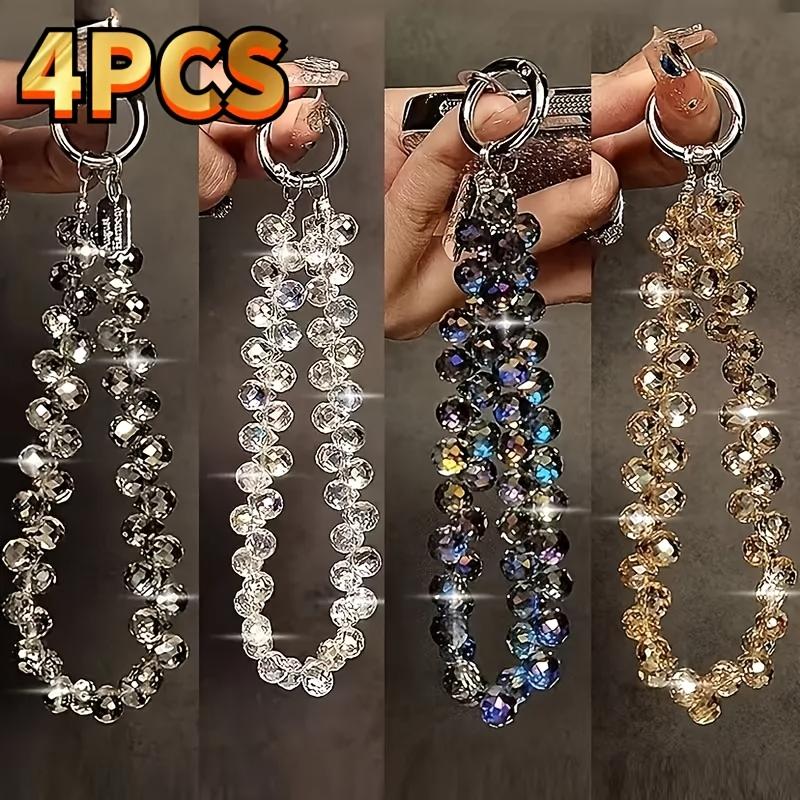 

4-piece luxury crystal phone lanyard short wrist strap, handmade beaded water drop pendant bracelet, elegant metal ring. разноцветный