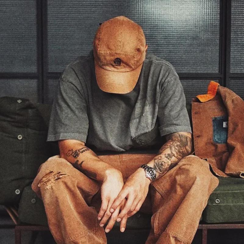 Men's Ripped Retro Denim Jumpsuit: Loose, Trending, and Versatile Casual Overalls.