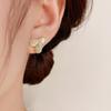 Silver needle zir*****pal flower stud earrings, small temperament design earrings, fashionable and versatile earrings.