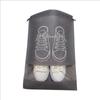 Dustproof & Moisture-proof Non-Woven Shoe Storage Bag with Drawstring for Travel Organization.