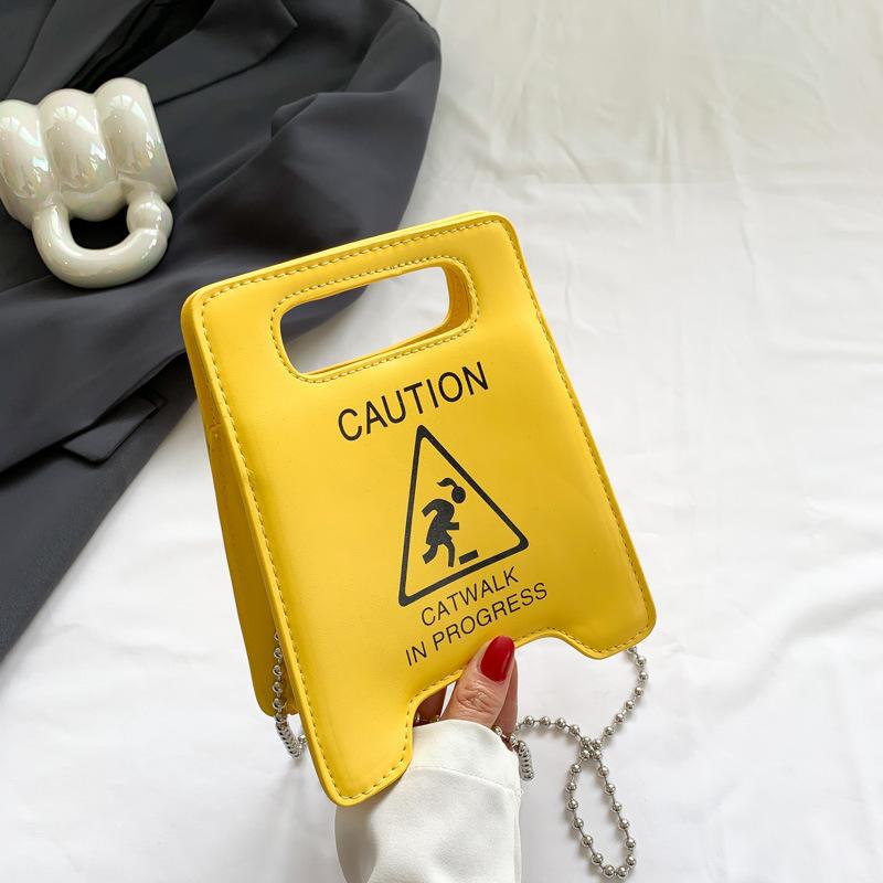 

Daifa popular creative printing warning sign single shoulder niche design multi-color fashion personalized handbag women жёлтый