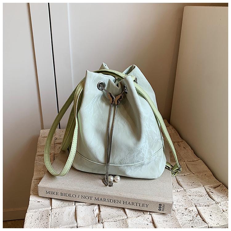 

Korean version of fashion backpack bag women s new summer shoulder bag high sense versatile foreign style underarm bucket bag зелений