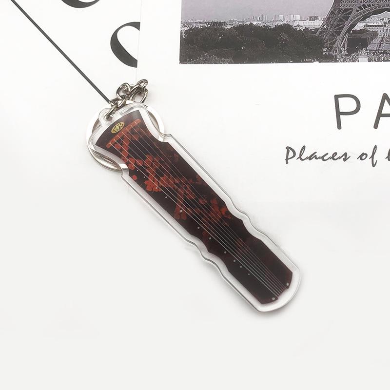 

Акриловый брелок в виде музыкального инструмента: Подвеска в виде скрипки и гитары