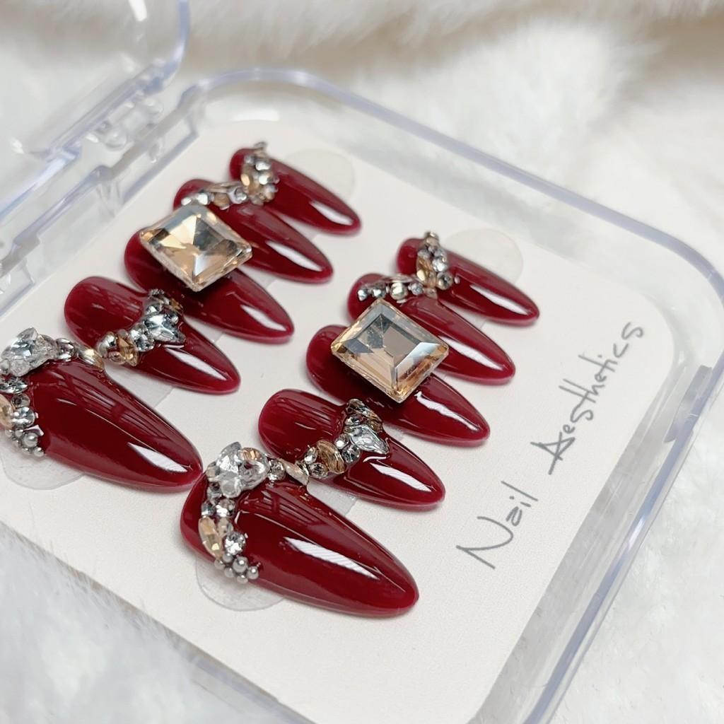 

Wearing Handmade Of Wine Red Almond Shaped Nails Brides New Year End High XS