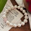 Original design, featuring a beaded pearl bracelet with natural Madagascar rose quartz beads