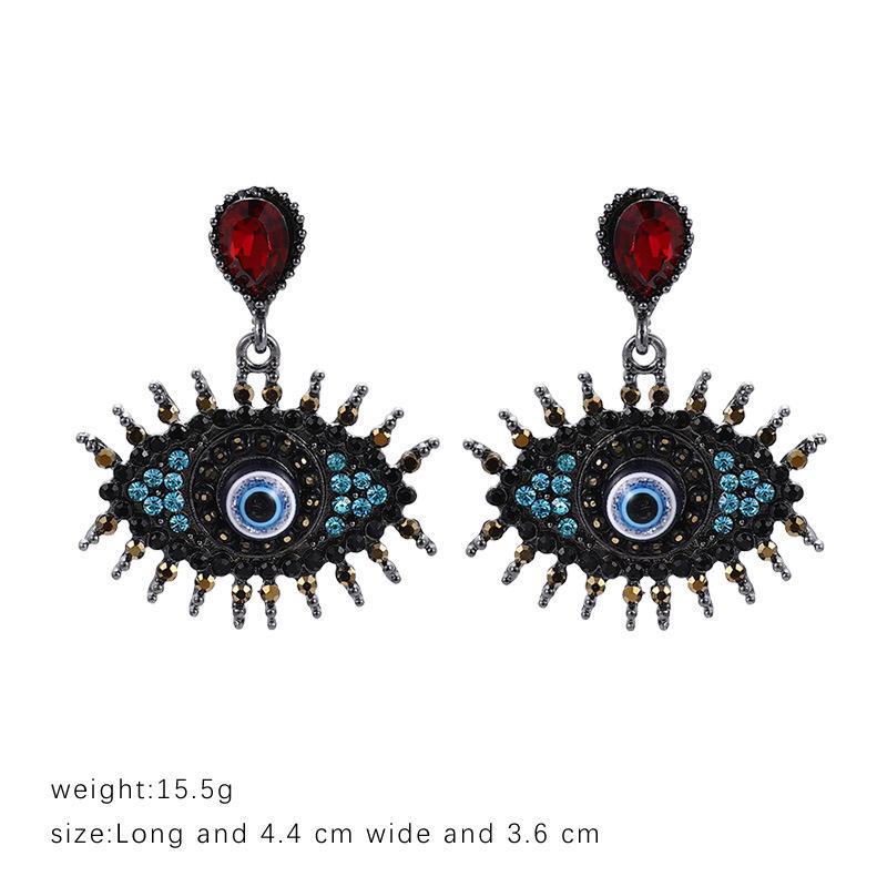 Devil's Eye Drip Oil Alloy Earrings: Trendsetting European & American Street Style
