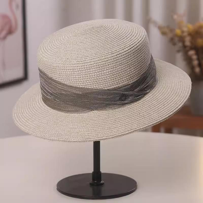 

Straw hat women s fashion beach outdoor sunscreen sunshade ribbon big eaves versatile sun hat women s niche top hat Adult average size (56-58cm) бежевий