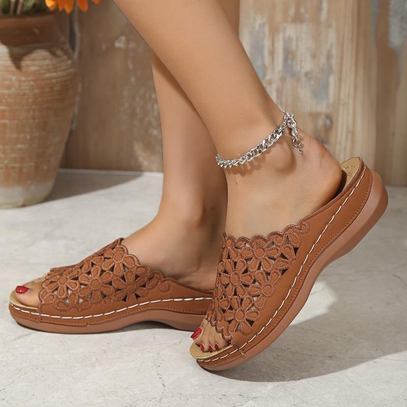 New simple floral hollowed-out thick-soled women's outerwear sloping heel lightweight beach flip-flops
