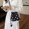 Versatile niche design polka dot drawstring bucket bag women's new commuter bag single shoulder messenger bag