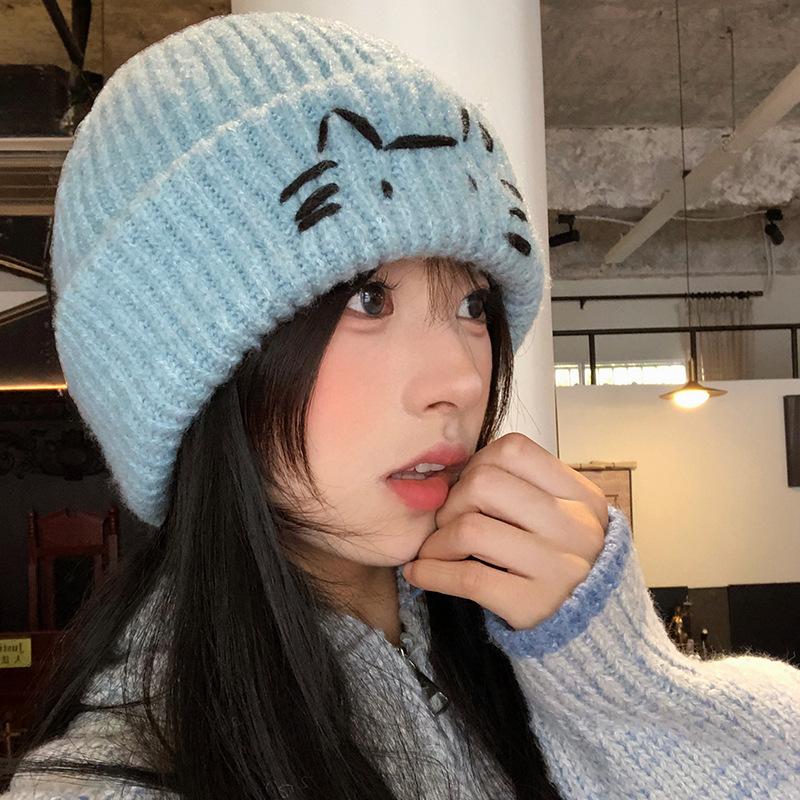 Cute cat embroidery blue knitted women's new sweet and versatile face small warm ear protector wool hat