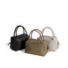 Neue handgewebte Lammfell-Kissen-Tasche Retro-Mode tragbare Umhängetasche Nischen-Temperament weiches Leder Damen-Tasche