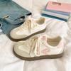 Sweet Korean little white shoes women's 2025 spring and summer new versatile niche design lightweight student explosion German training board shoes