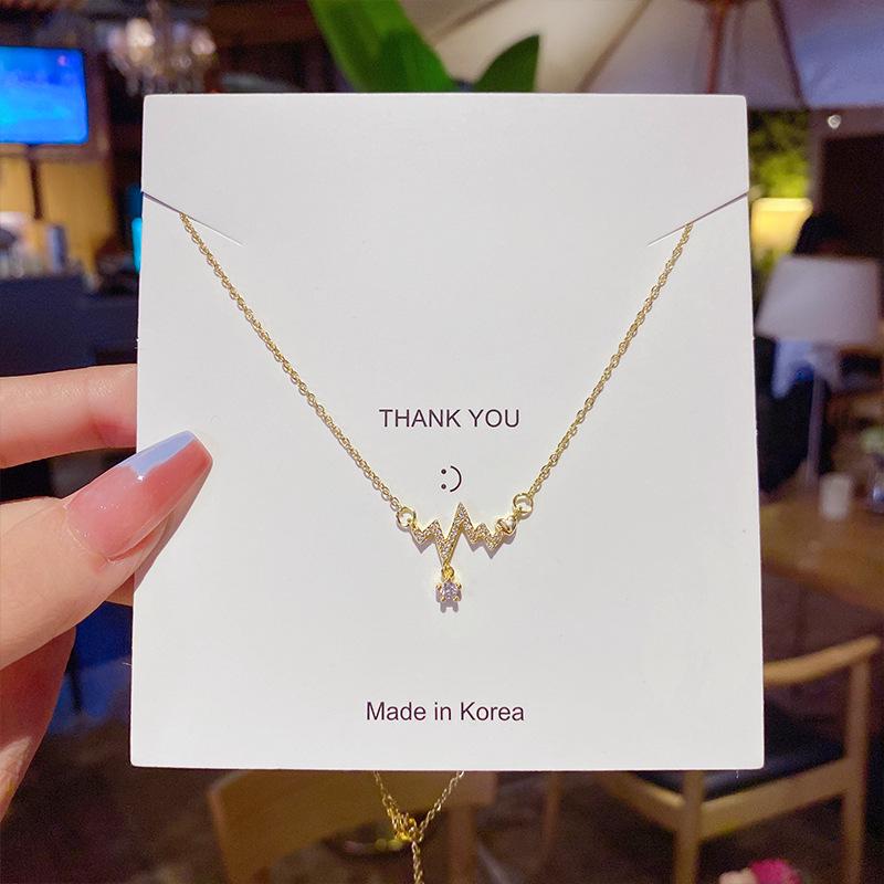 Minimalist Clavicle Necklace: Japanese & Korean Style, Luxurious Real Gold-Plated Titanium Steel Pendant for Women