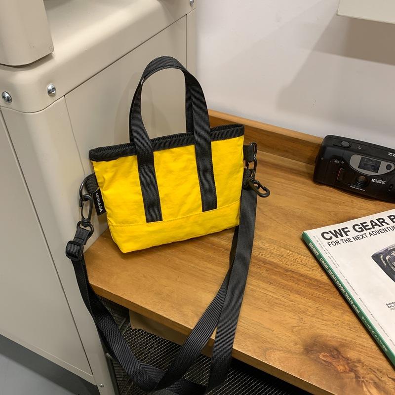 Crossbody bag women's small bag 2025 new foreign style personalized solid color portable simple shoulder bag trendy casual bucket bag