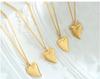 Stylish Heart Pendant Necklace: 18K Gold-Plated Titanium Steel, Cold-Style Clavicle Chain for Women