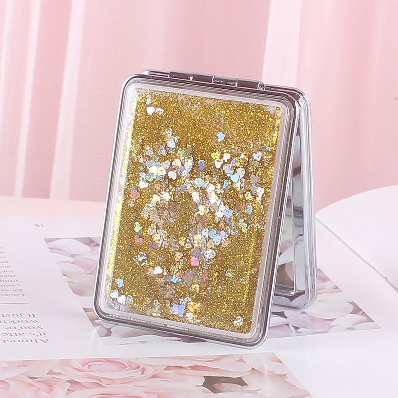 Girlish Heart Double-Sided Portable Makeup Mirror - Cute, Compact, and Foldable.