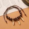 Retro Tibetan braided dog tooth bracelet handmade exotic personalized hand rope niche stacked wear men's and women's accessories