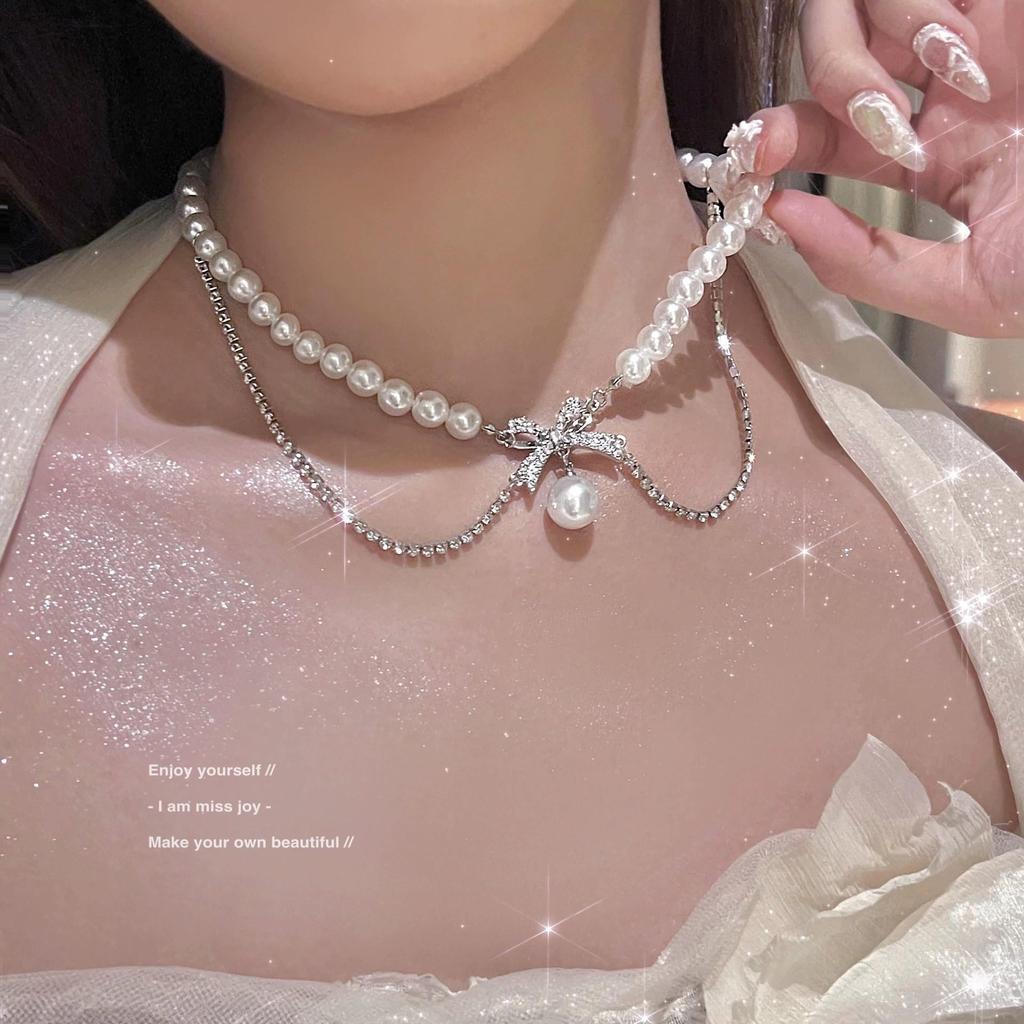 Elegant Silver Pearl Necklace: High-End Design for Women - Versatile and Chic Clavicle Accessory.