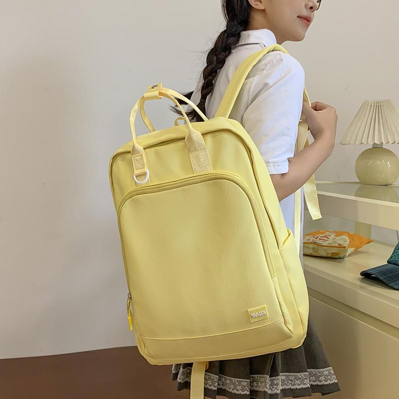 Handbag for primary school students, girls, junior high school students, new solid color backpack