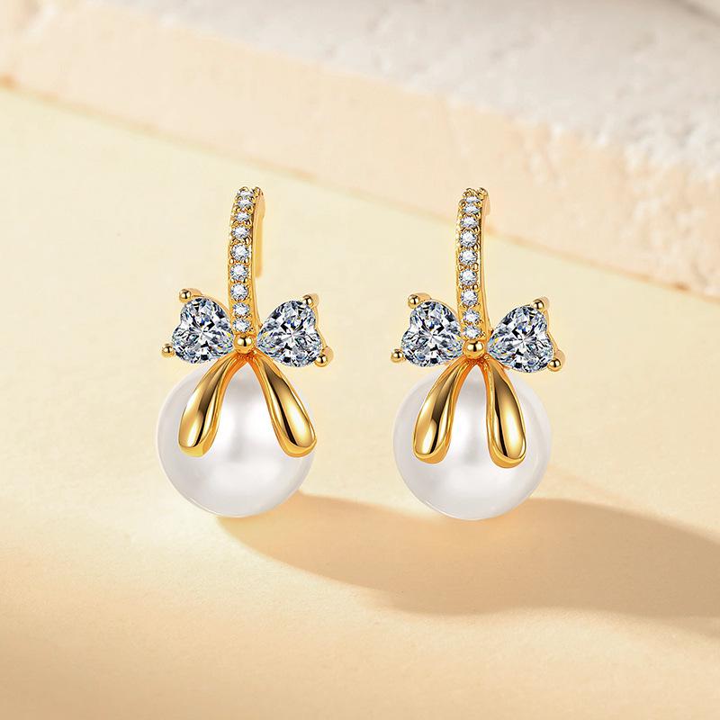 Elegant Korean Zircon Bow Pearl Stud Earrings: Stylish, Luxurious, and Versatile Design for Women