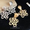 European and American Silver Needle Metal Hollow Flower Pendant Earrings Light Luxury High-end Stud Earrings Retro Temperament Earrings Women