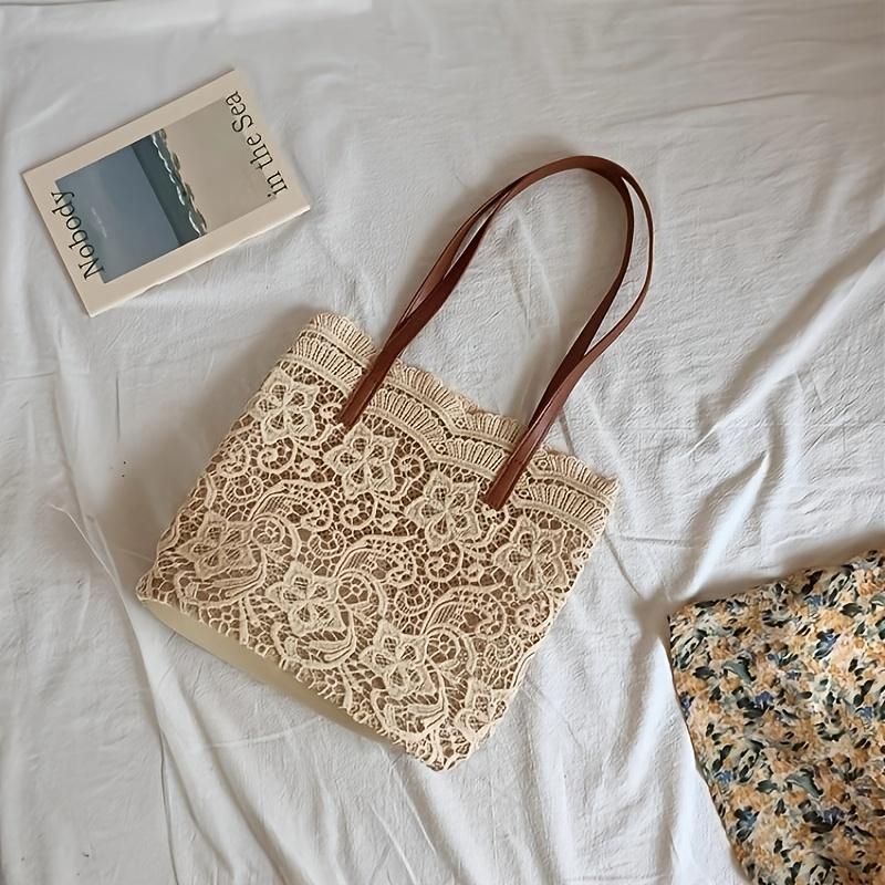Korean style new fashionable women s lace handbag, lace wrist bag, women s shoulder bag, hollowed-out beach bag