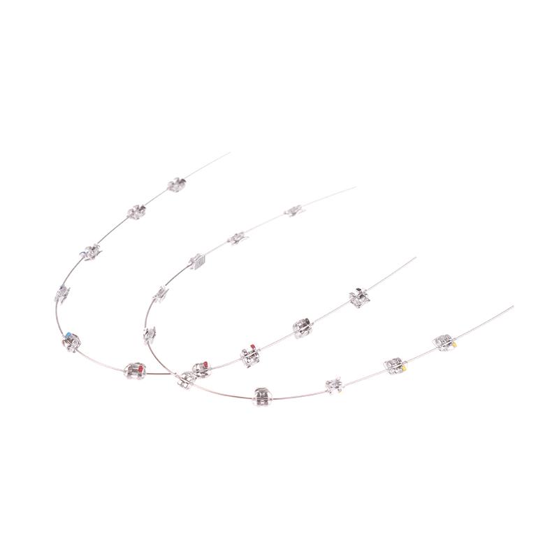 2 Stück Mode Split-Typ Mini Bunte Brackets Fake Zahnspangen Ohne Haken Temporäre Zahndekoration Metallbracket Zahnwerkzeug