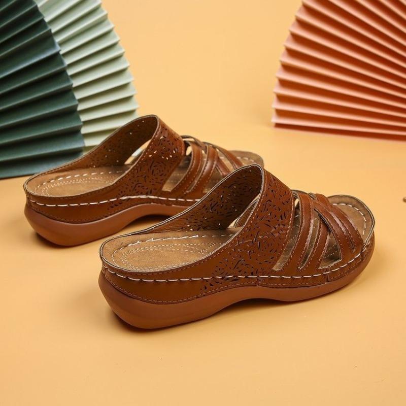 Thick-soled hollowed-out carved slippers women's slope heel open-toed beach shoes wish cool slippers