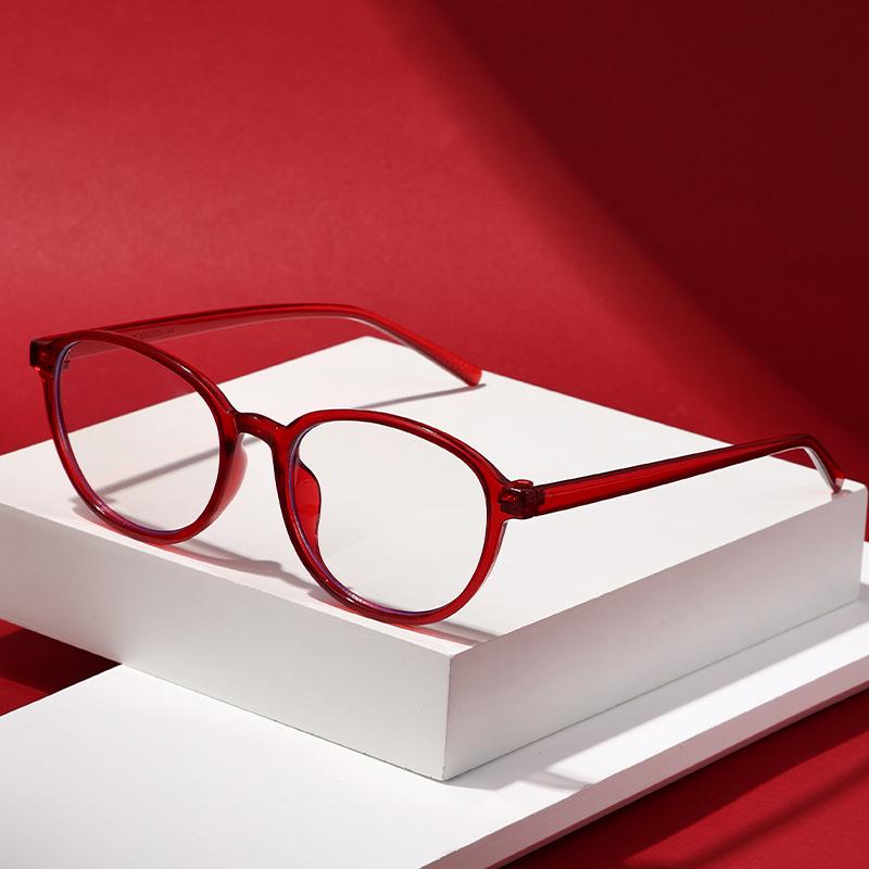 Retro Oval Blue Light Glasses with Smart Photochromic Lenses for Clear Vision and Eye Protection.