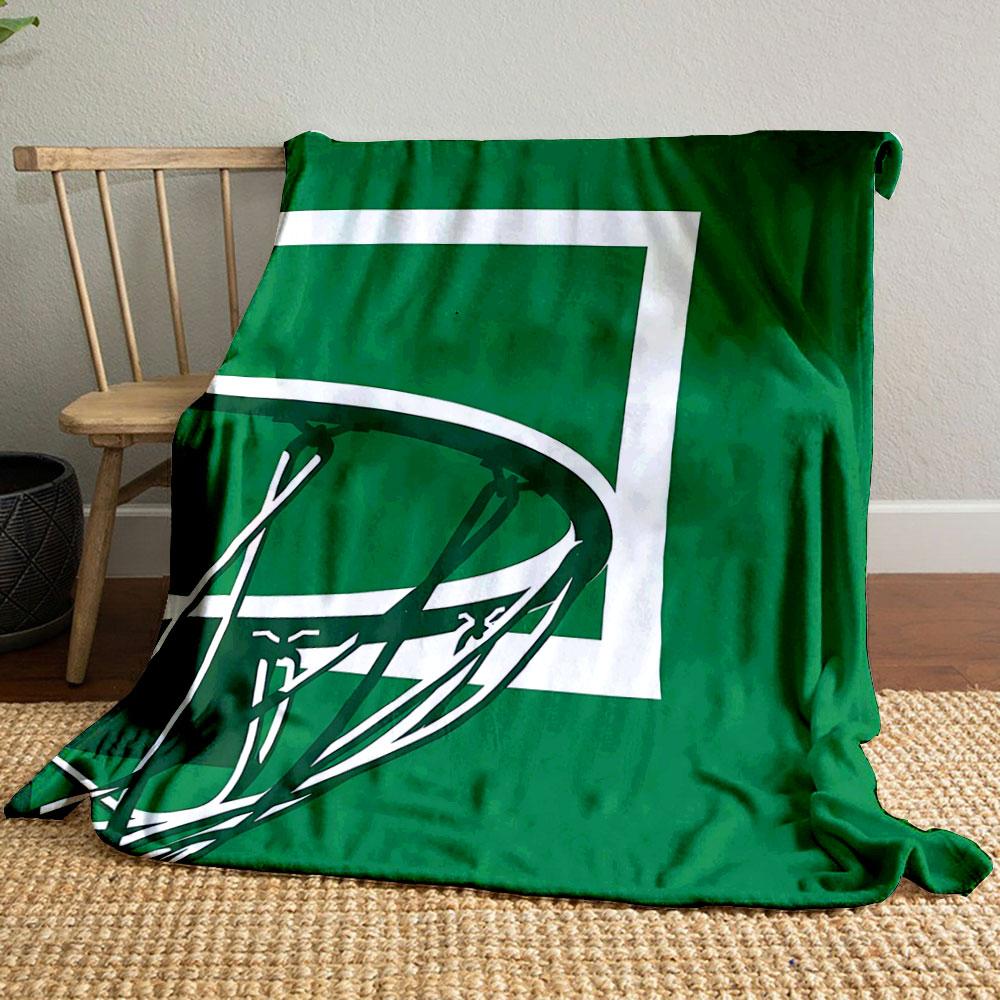 Basketball hoop and net silhouetted against a green background. for all seasons blanket lunch break throw gift