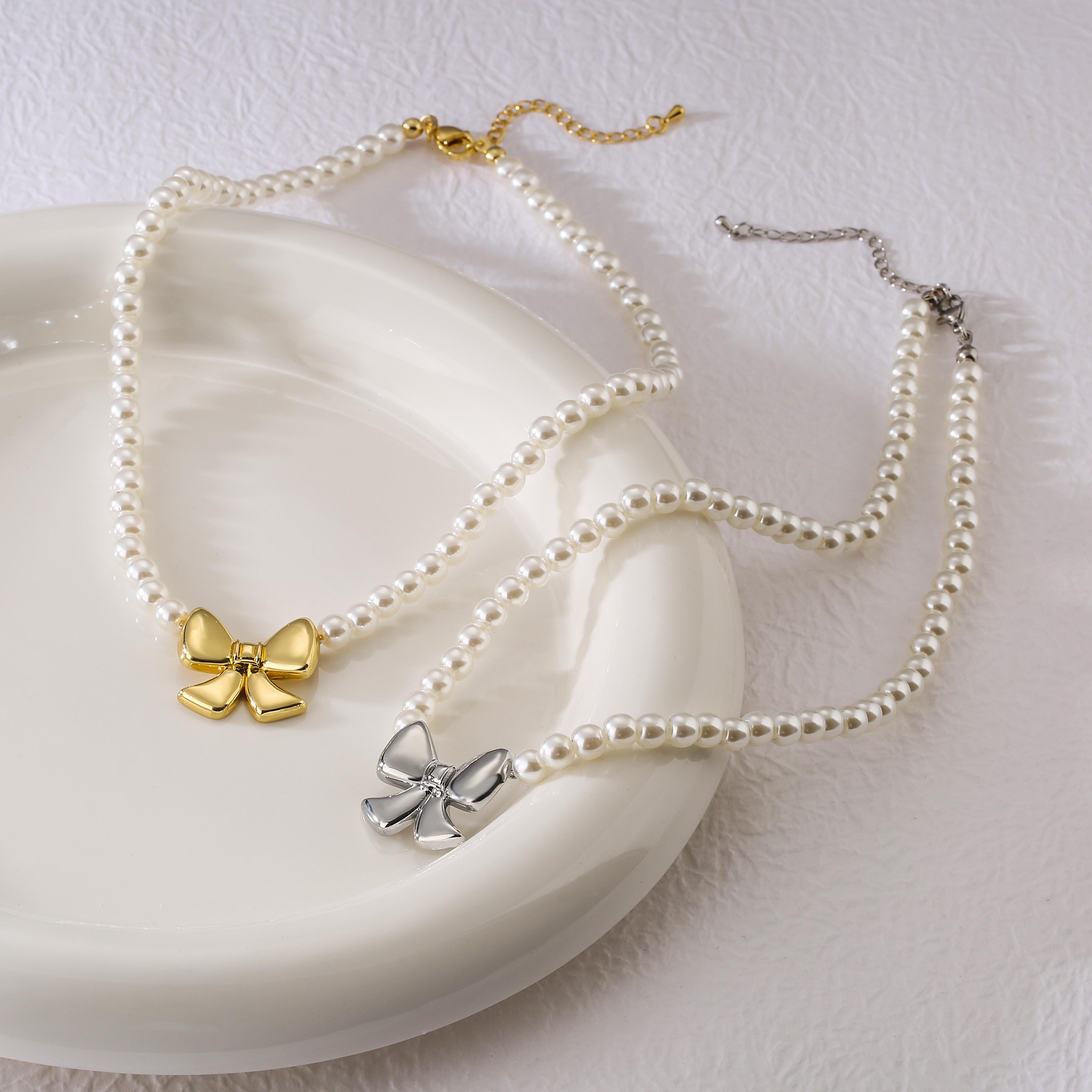 

HECHENG,Sweet Bow Tie Necklace for Women Pearl Pendant Necklace Feminine Light Luxury Niche Design Sense Advanced Clavicle Chain 37.5cm золотой