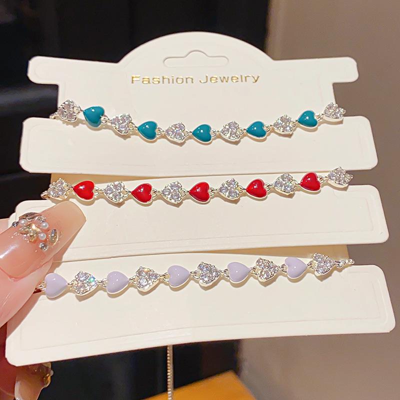 Bracciale Splice ad Olio con Cuore di Zircone – Gioiello di Moda Elegante e Versatile per Donne