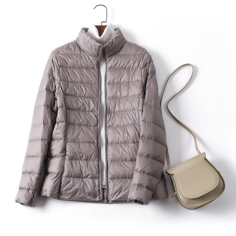 

Легкая куртка-пуховик для женщин, новинка 2025 года, короткая, белая, модная, осень-зима, большой размер, легкая куртка с капюшоном 6XL