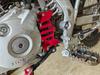 CRF125F Shift Shaft Support & Sprocket Guard (Red)