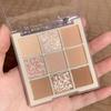 DIKALU Nine-Color Milk Tea Eyeshadow Palette: Acrylic Nude Series with Shimmer & Matte Finish.
