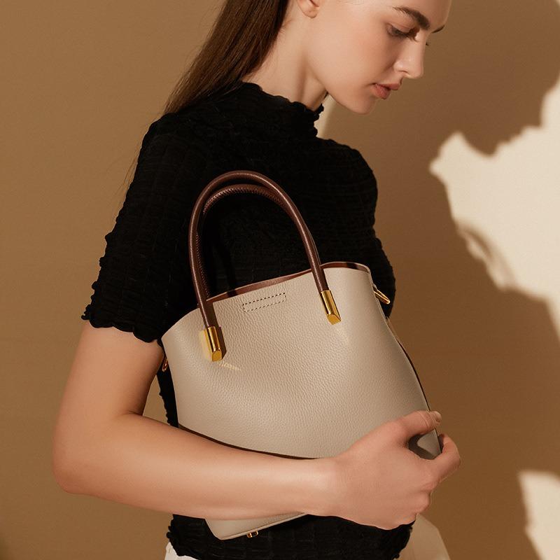 Spring and summer niche leather bucket bag women's versatile handbag high-end casual messenger bag cowhide bag
