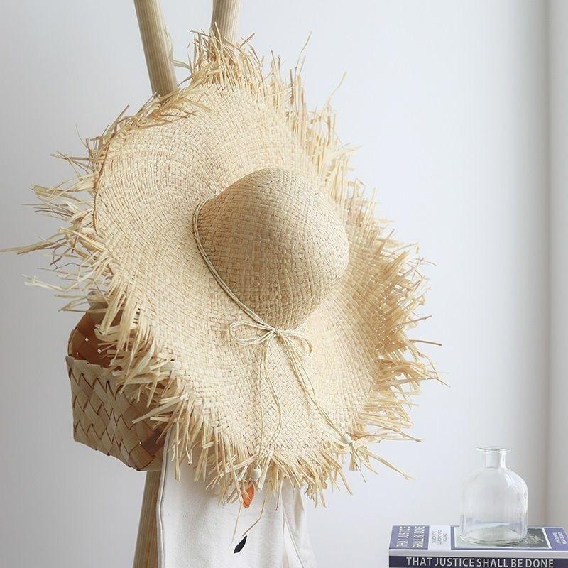 Spring and summer new rough edge big brim Lafite straw hat women's summer tide with beach hat seaside vacation sun hat tide