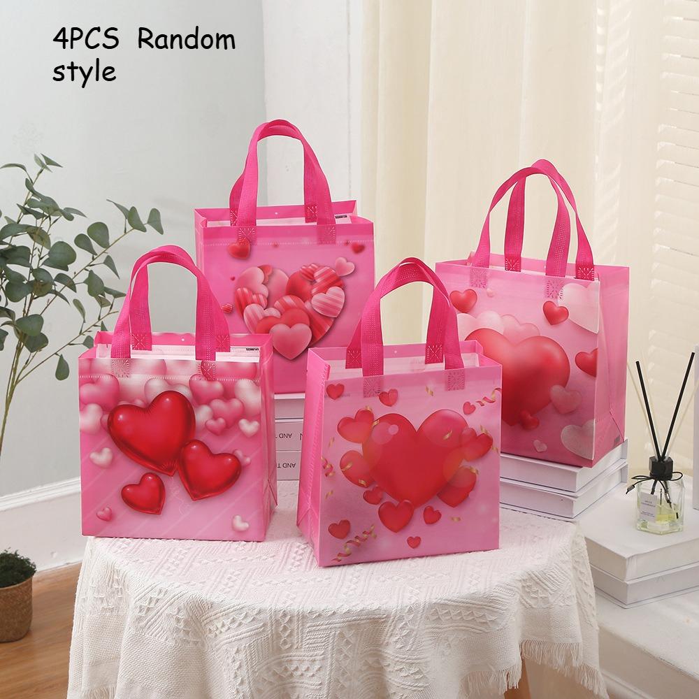 

8pcs/4pcs Non woven heart-shaped pattern tote bag, reusable gift bag, durable material, heart-shaped print, For party gift bags Other