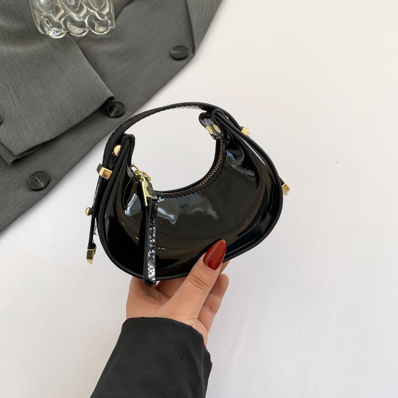 

Женские сумки женские сумки 2025 новый Мори конфетный цвет глянцевый инс интернет-знаменитость портативная сумка-пельмень тренд чёрный