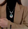 Women's Court Style Long Sweater Necklace with High-End Rhinestone Inlaid Oval Pendant