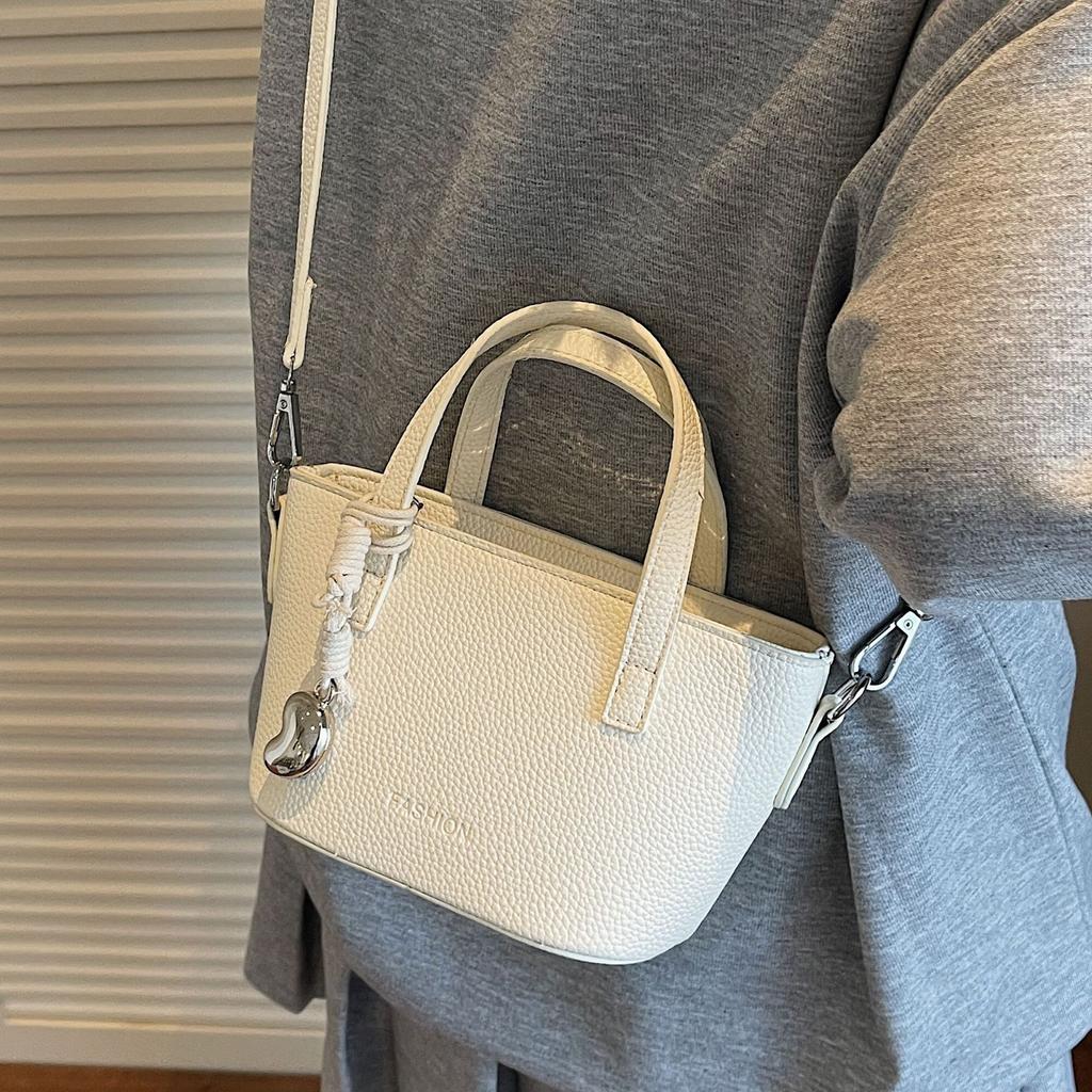 Casual and simple portable bucket bag women's 2025 summer new fashion versatile trend niche design shoulder messenger bag