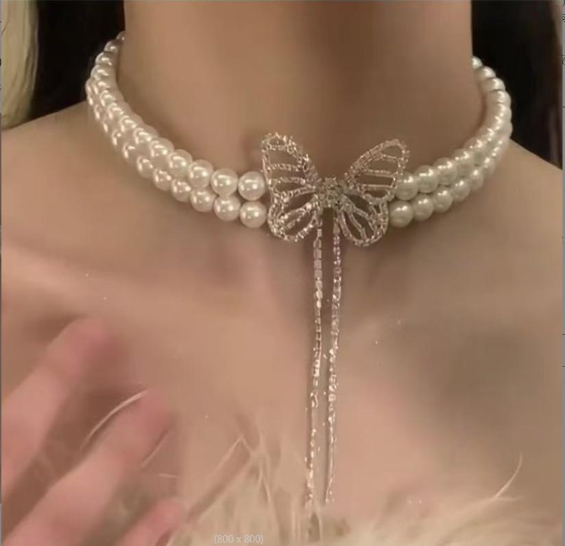 

Вишукане кришталеве кольє-чокер: Елегантні розкішні прикраси для жінок