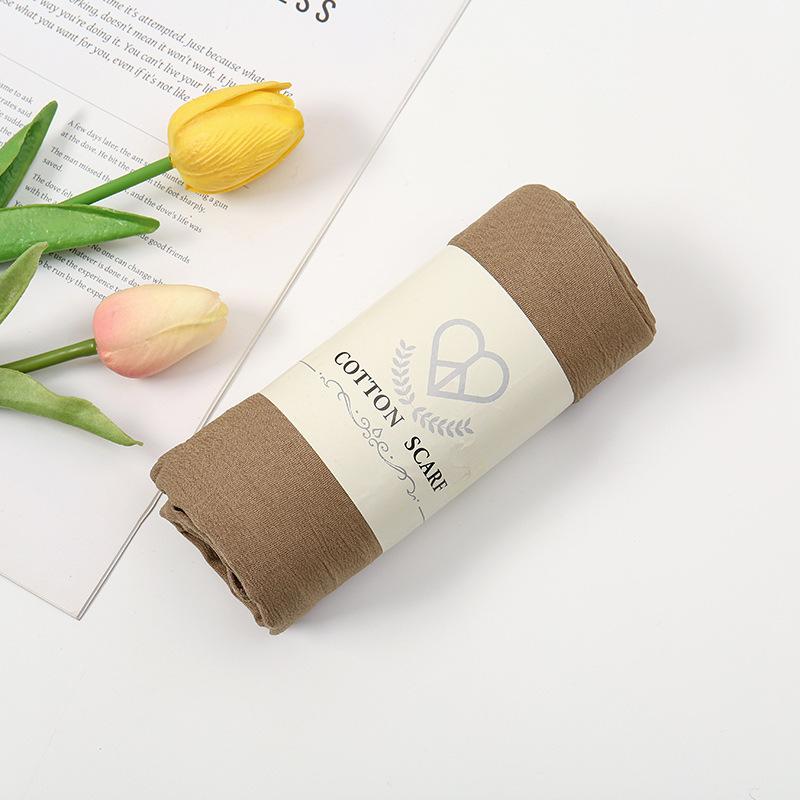 Autumn and winter new micro-elastic crumpled cotton blended long towel right angle lock edge polyester headscarf hot-selling solid color scarf